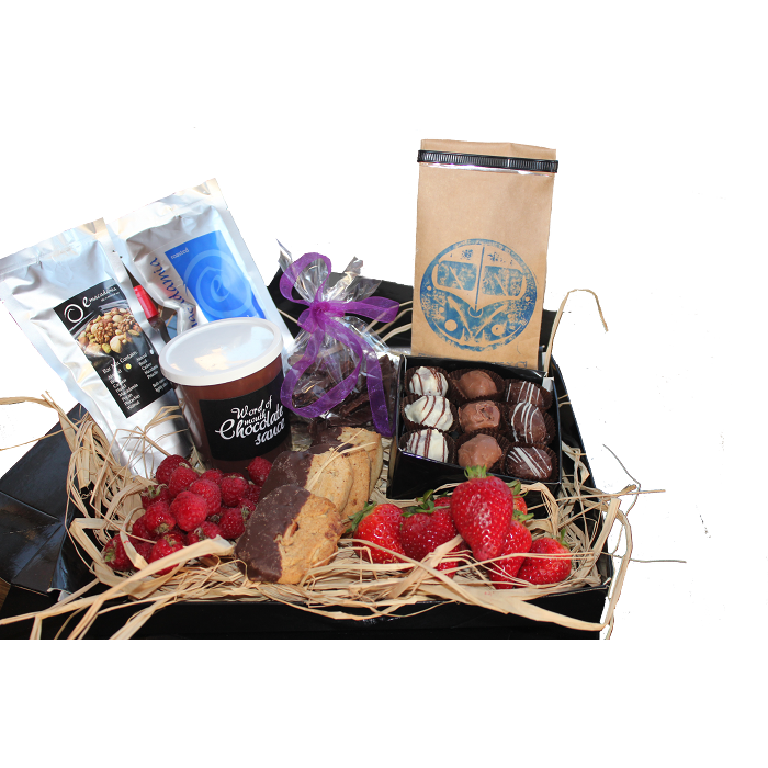 A selection of Giles Chocolatier products alongside fantastic locally produces products all showcased in a black box