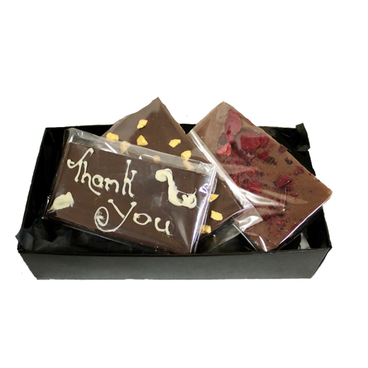 Black box full with different chocolate bars and truffles from Giles Chocolatier