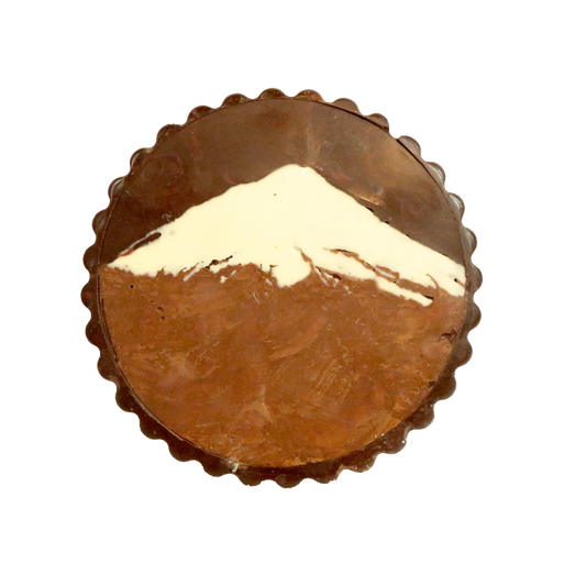Chocolate Disk featuring a chocolate  Mount Taranaki on top of it