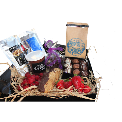 A selection of Giles Chocolatier products alongside fantastic locally produces products all showcased in a black box