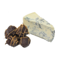 A stack of chocolate truffles with blue vein cheese centre sitting next to a chunk of blue vein cheese