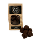 Pile of Juno Gin truffle next to a Giles chocolatier bag filled with scrumptious juno Gin truffles