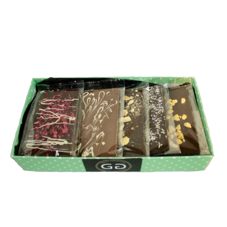 Green box containing a selection of giles chocolatier bars