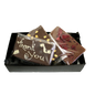 Black box full with different chocolate bars and truffles from Giles Chocolatier