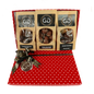 Red spotted box full with different chocolate bars and truffles from Giles Chocolatier